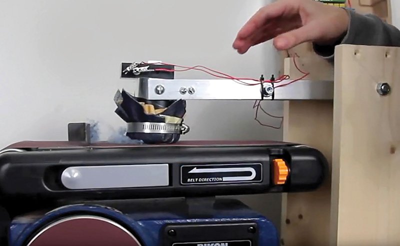 Cambridge machine for testing abrasion resistance